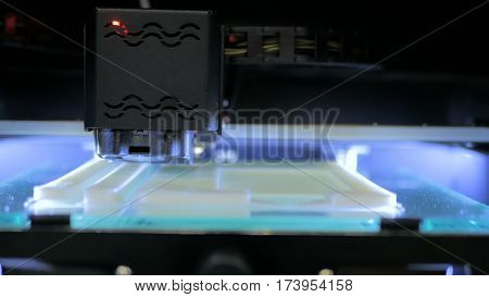 Three dimensional printing machine. 3D printer during work