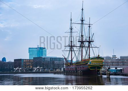 Ships on the canals in Amsterdam. City landscape. Winter season
