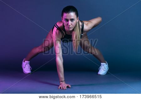 Sportswoman Do Plank On One Hand