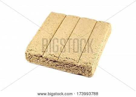 traditional halvah on white background, sweet food.