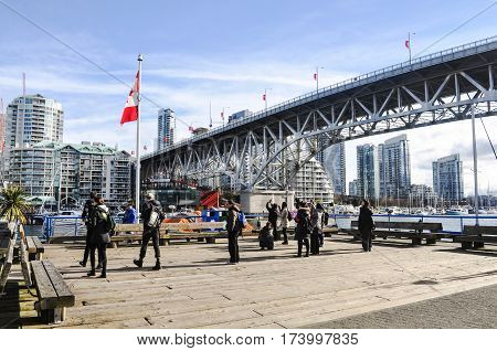 March 27 2017- Granville Island Bridge with tourist people located at Vancouver,BC Canada