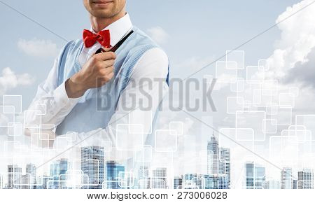 Double Exposure Of Confident And Young Businessman In Smart-casual Wear Smoking Pipe And Modern City