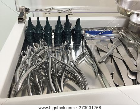 Set Of Nasal Speculum In Different Sizes And Depressors In Medical Clinic. Medical Instrument For En