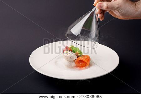 Molecular Modern Cuisine Gravlax Trout With Garlic Ice Cream On A Black Background.