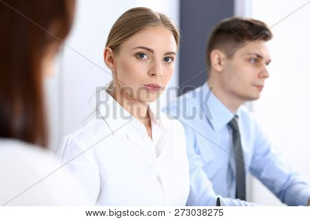 Group Of Business People Or Lawyers Discussing  Terms Of Transaction In Office. Colleagues Working A