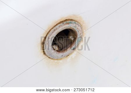 Close-up For Dirty Sink Hole With Limescale.