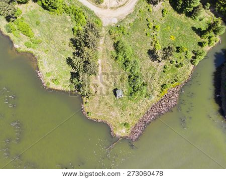 Aerial View Of Lake And Pasture. Cuejdel Lake Is The Biggest Natural Dam Lake In Romania. It Has Its