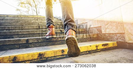 Man In Beautiful Brown Leather Shoes Walks The Granite Stairs In An Urban Environment. Blank Backgro