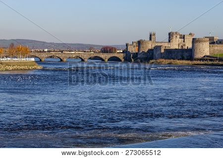 Castle, Stone Bridge And Shannon River