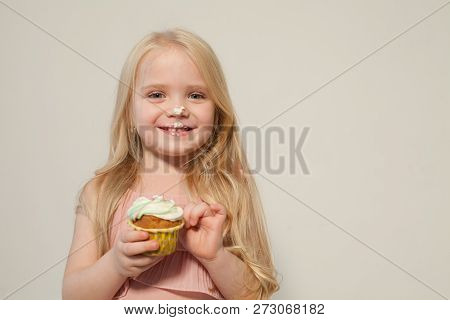 Beautiful Little Girl Blonde With Cake And Candy Portrait Of Food