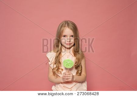 Beautiful Little Girl Blonde With Cake And Candy Portrait Of Food