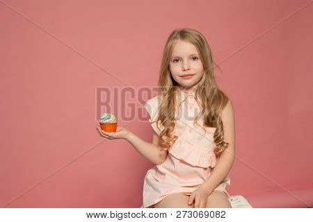 Beautiful Little Girl Blonde With Cake And Candy Portrait Of Food