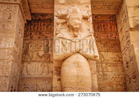 Statue Of Egyptian Pharaoh Ramses 3 In The Temple Of Medina Habu.