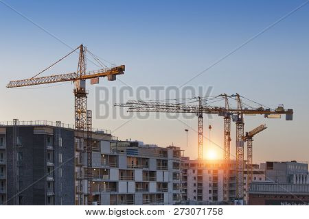 Construction Cranes Work In Thef Helsinki In Winter