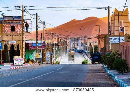 Merzouga, Morocco - 02 August 2018: The Berber Town Of Merzouga Village With Its Typical Berber Arch