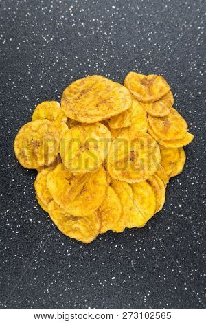 Pile Of Crunchy Sliced Dehydrated Plaintain Fruit Chips