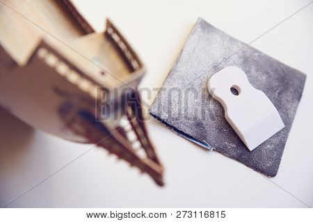 Mini Spater And Pipe Near The Manufacture Of A Ship Model