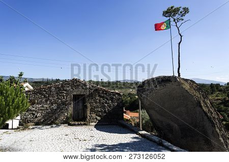 View Of The Square In Front Of The Impressive Granite Boulder, The Highest Point In The Village Of M