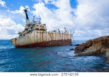 Old Ship Wreck And Blue Water Beach. Travel Photo 2018, December. Landscape And Nature.