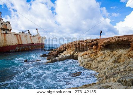 Old Ship Wreck  And Girl. Blue Water Beach. Travel Photo 2018, December. Landscape And Nature.