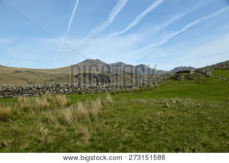 The Scafell Pike Range Of Hills Seen From The Hard Knott Fort In The English Lake District