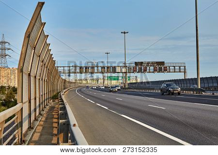 St. Petersburg, Russia - August 28, 2018: Automobiles Drive Along The Expressway With Steel Barrier 