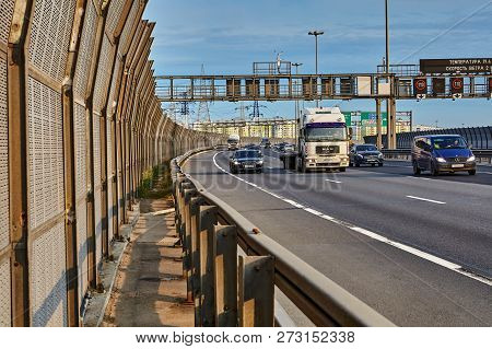 Saint Petersburg, Russia - August 28, 2018: Cars And Lorry Are Driving Along The Ring Road With Soun