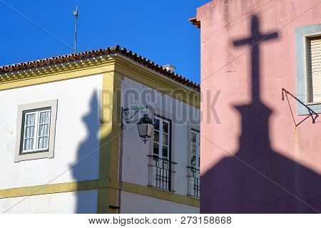 Shadows Of Matriz Church (nossa Senhora Das Dores) On Colorful Facades Inside The Old Town Of Monchi