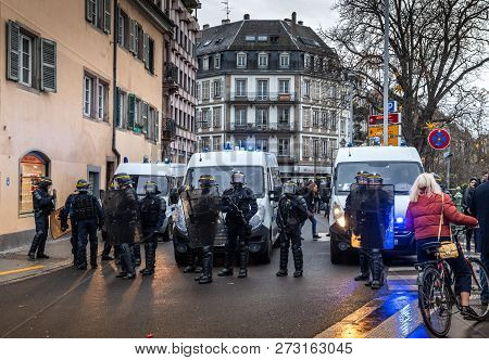 Strasbourg, France - Dec 8, 2018: Front View Of Police Officers Securing The Zone In Frong Of The Ye