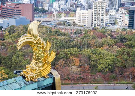 Osaka, Japan, November 25, 2018: Shachihoko (shachi) At World Famous Osaka Castle Roof In Autumn Wit