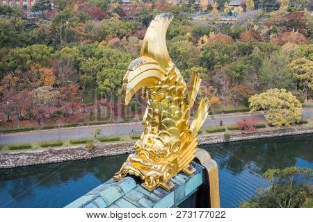 Osaka, Japan, November 25, 2018: Shachihoko (shachi) At World Famous Osaka Castle Roof In Autumn Wit