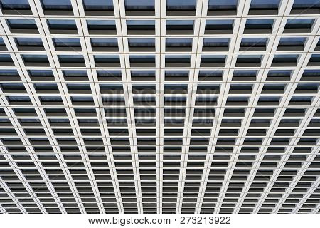 Bottom View Glass Grey Square Windows Of Modern City Business Building Skyscraper. Receding Perspect