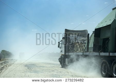 Truck On A Dirt Gravel Road In Botswana
