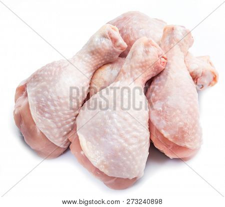 Raw chicken legs isolated on white background.