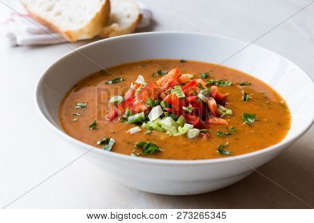 Traditional Konya Bulgur Soup Batirik With Sliced Cucumber, Tomatoes, Onion And Parsley