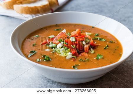 Traditional Konya Bulgur Soup Batirik With Sliced Cucumber, Tomatoes, Onion And Parsley