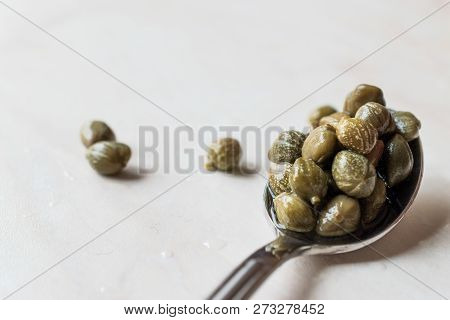 Edible Capers In Spoon Ready To Eat.