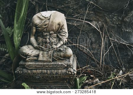 The Brainless Figurine Of Buddha Costs Under A Tree
