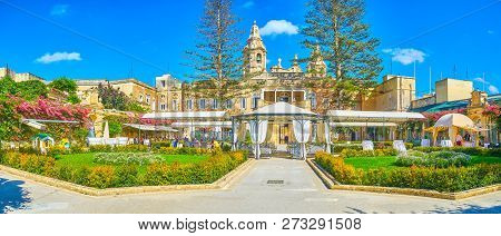 Naxxar, Malta - June 14, 2018: The Panoramic View On Restaurant, Located In The Courtyard Of Palazzo