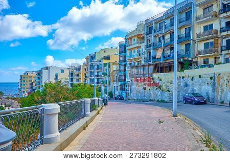Bugibba, Malta - June 14, 2018: The Seaside View Residential Buildings On The Hills Of The Resort St