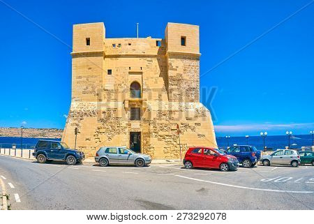 The Frontage View On The Wignacourt Tower, Standing At The Edge Of Cliff, Overlooking The Surroundin