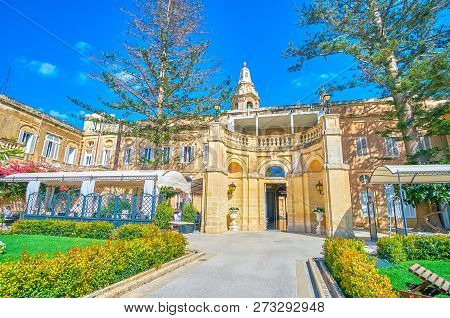 Naxxar, Malta - June 14, 2018: The Inner Courtyard Of Palazzo Parisio With Covered Pavilions, That S