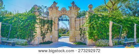 Naxxar, Malta - June 14, 2018: Panoramic View On Inner Gates Of Garden Of Palazzo Parisio In Lush Gr