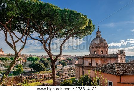 View Of The Forum Of Caesar With The Church Of Santi Luca E Martina On The Right And The Cityscape O