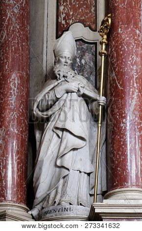 BRESSANONE, ITALY - JULY 14, 2018: Saint Ingenuinus statue on the Cassian altar in the Cathedral of Santa Maria Assunta i San Cassiano in Bressanone, Italy