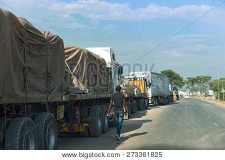 Kazungula, Botswana-november 17, 2018: Trucks Are Waiting For The Kazungula Ferry Across The Zambezi