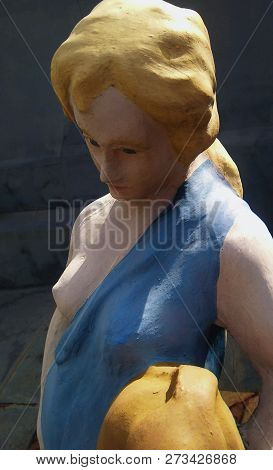 Statue Made By Hand With A Look Of Sadness