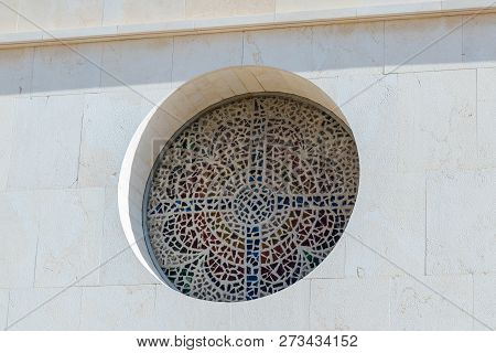 Madaba, Jordan, December 05, 2018 : Stained Glass Window In The Form Of A Cross In Memorial Church O