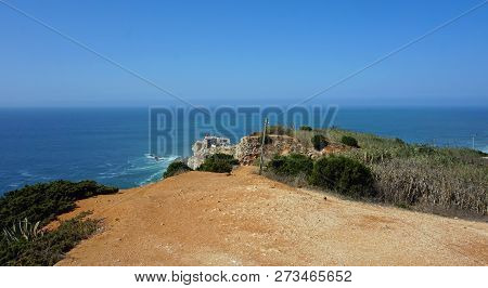Famous Surf Spot At Nazare Lighthouse In Portugal