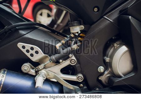 Detail On A Modern And Dirty Motorcycle Engine With Oil Fugues.